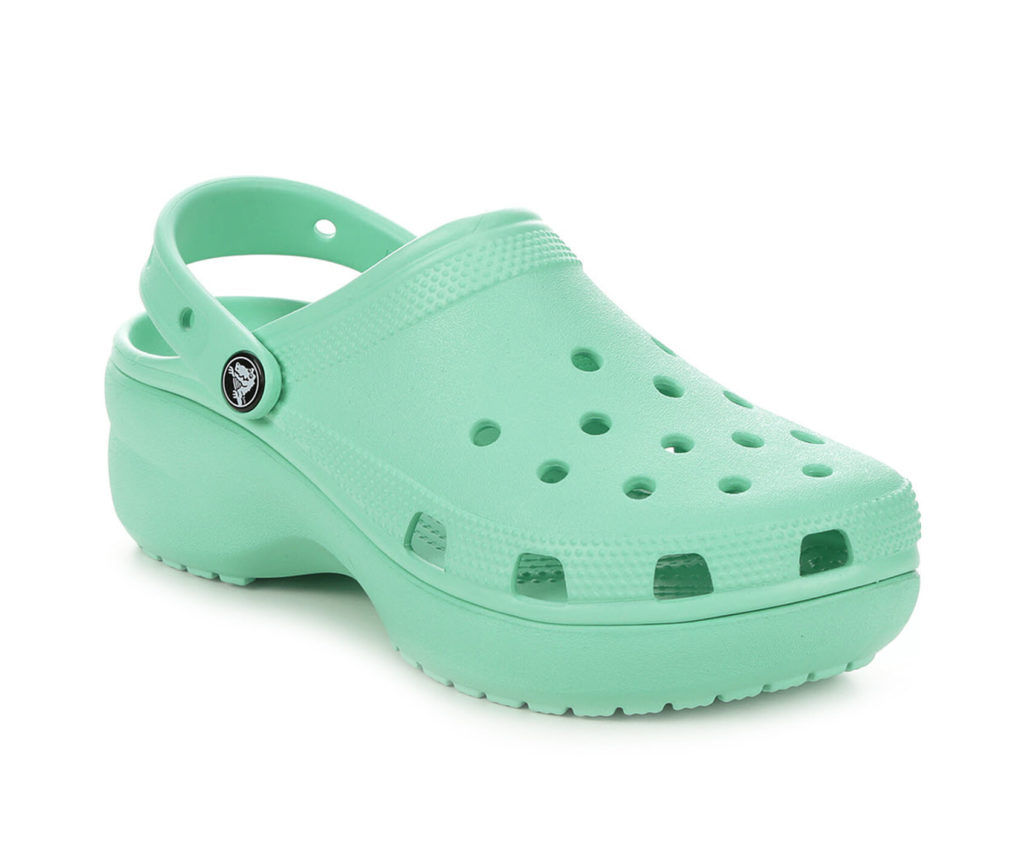 Elevate your look with green platform Crocs clogs