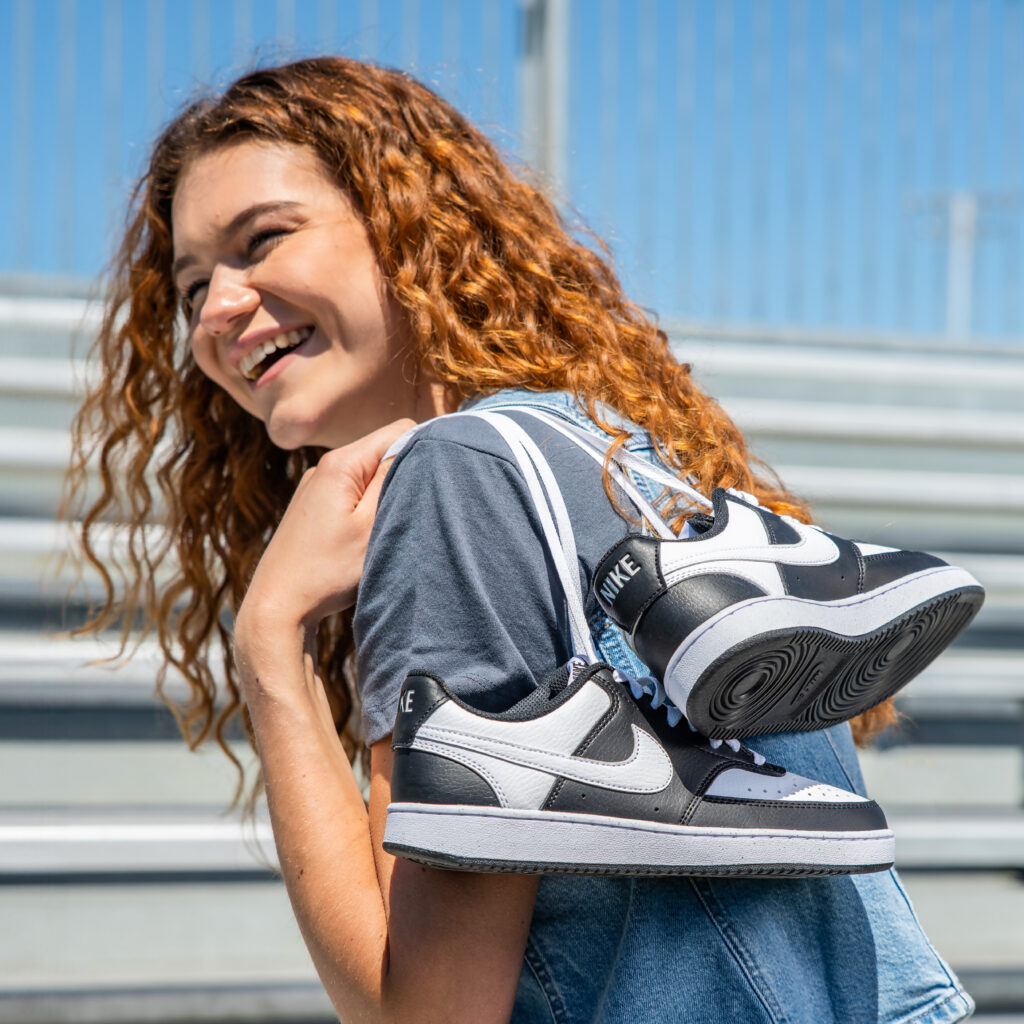 Girl with Nike sneakers.