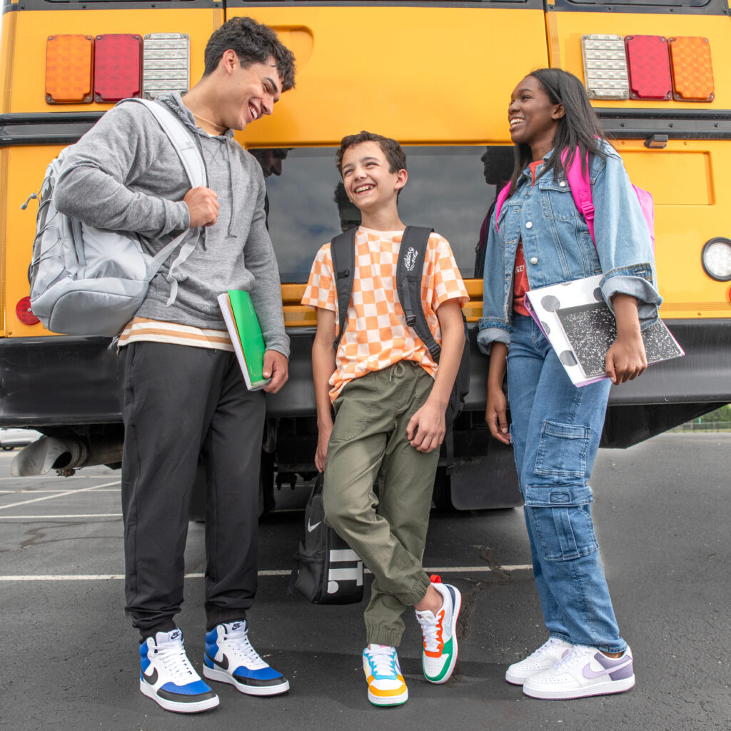 Kids wearing Nike Court Borough sneakers