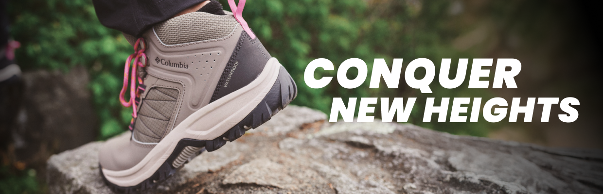 Woman's hiking boot with text, "Conquer New Heights"